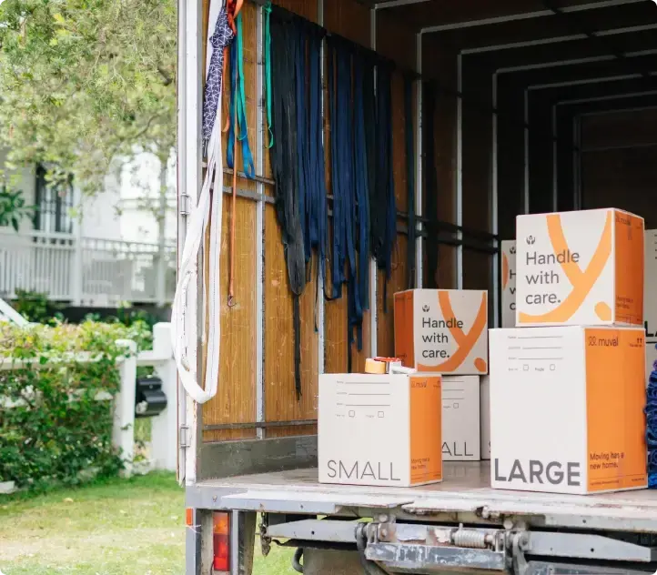 Muval interstate moving boxes on the back of a removalist truck