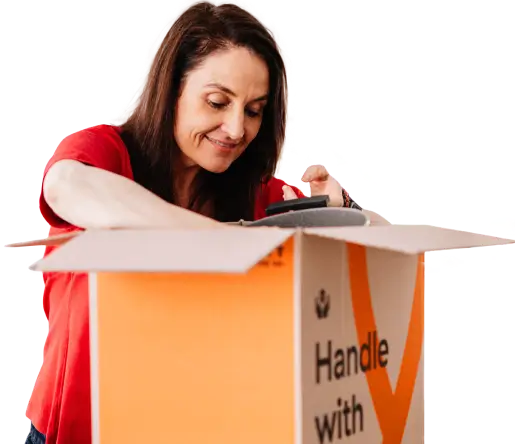 Woman packing a moving box